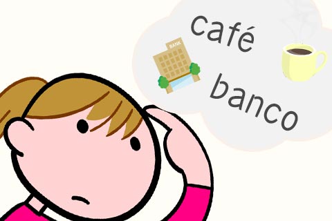 カフェ、銀行身近なスペイン語の単語を思い浮かべる女性 カフェ、銀行身近なスペイン語の単語を思い浮かべる女性